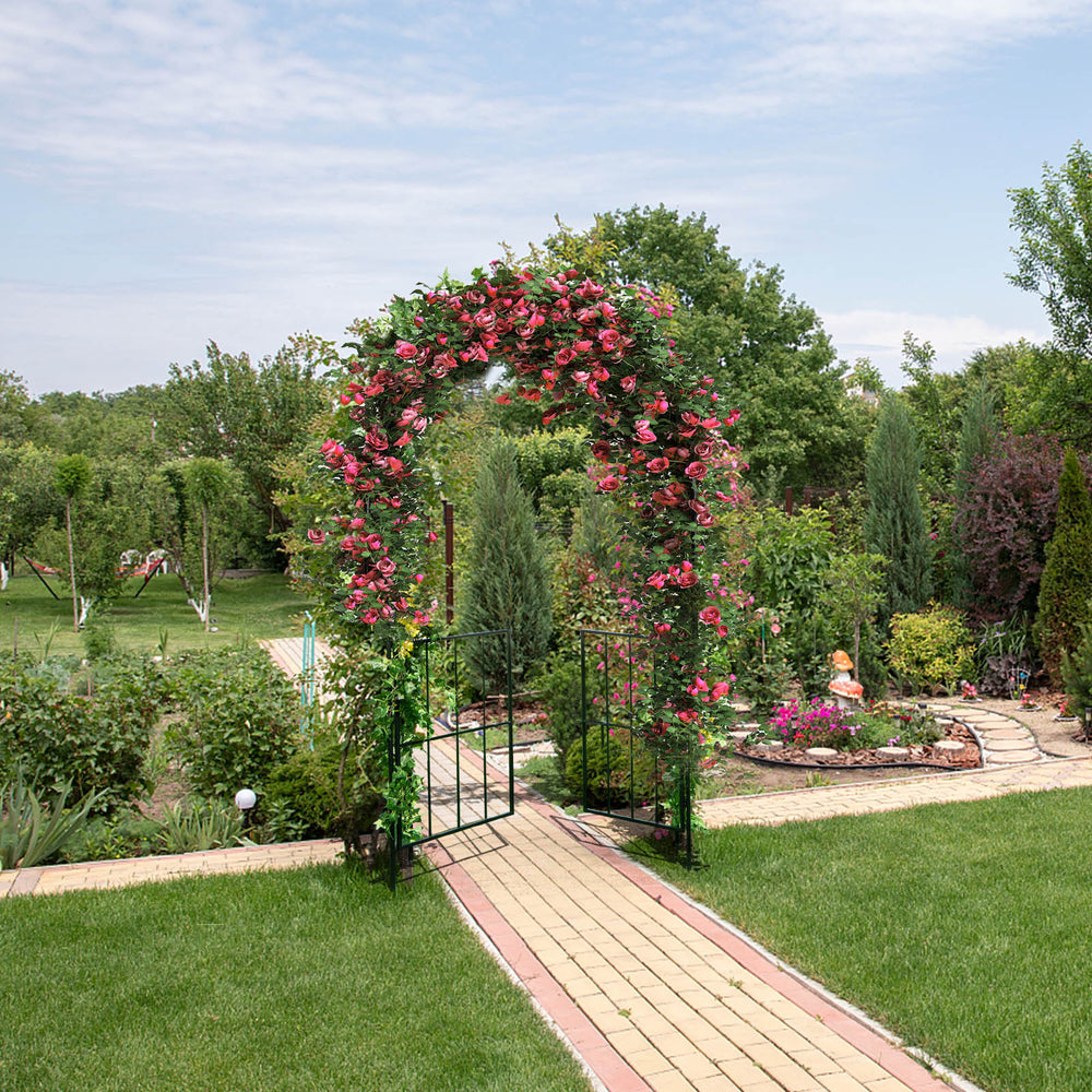 Garden arch arbor trellis with gate in black, featuring climbing plant support and elegant design for outdoor spaces.