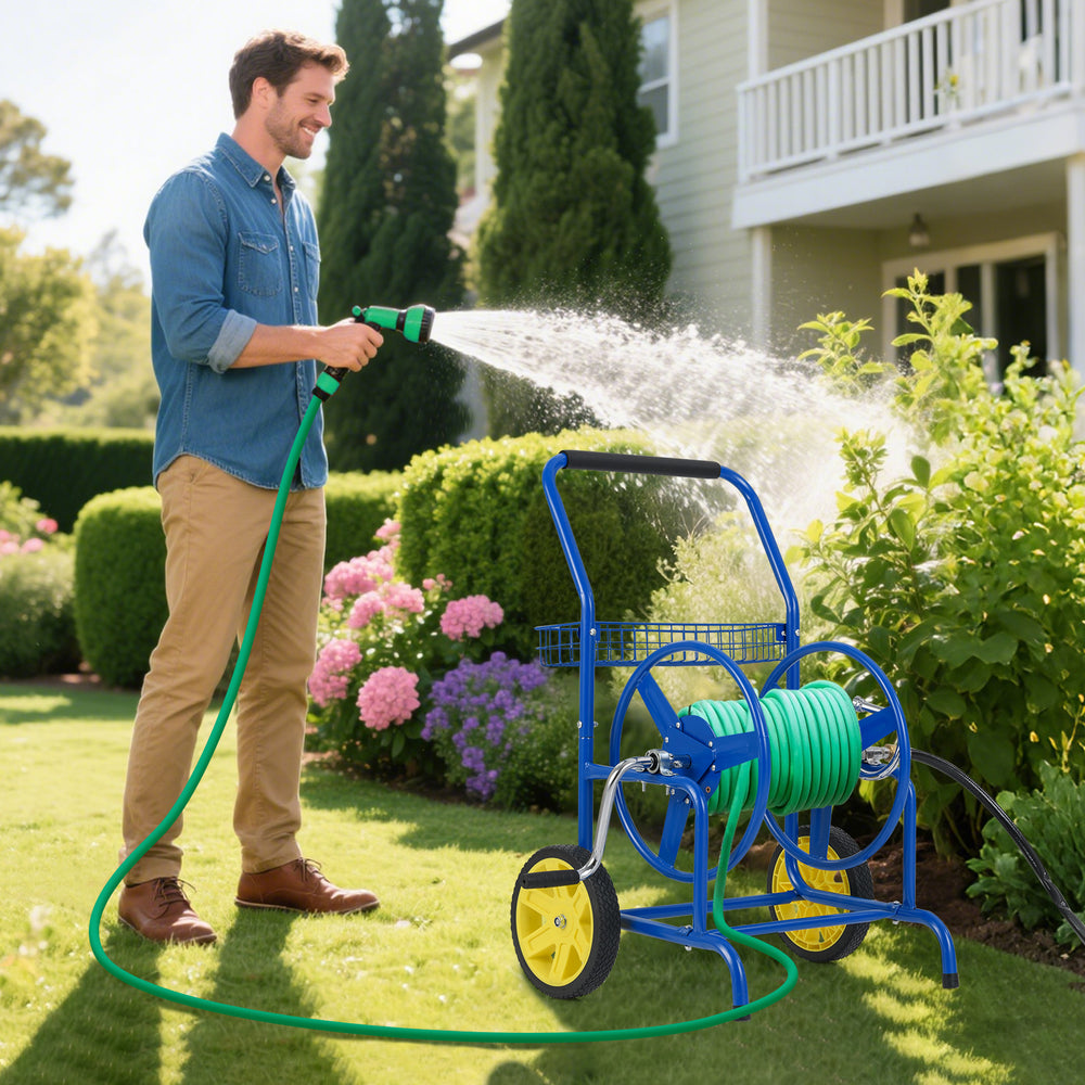 Garden hose reel cart in blue with two wheels, holding a hose, ideal for watering plants and yard maintenance.