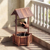 Wooden wishing well water fountain with barrel and roof, ideal for garden ambiance, featuring a self-contained pump.