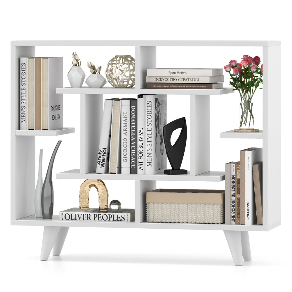 Geometric white bookshelf showcasing decorative items and books, designed for stylish storage in any interior space.