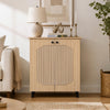Geometric 2-door cabinet in natural finish features carved panels and ample storage for footwear in entryway or hallway.