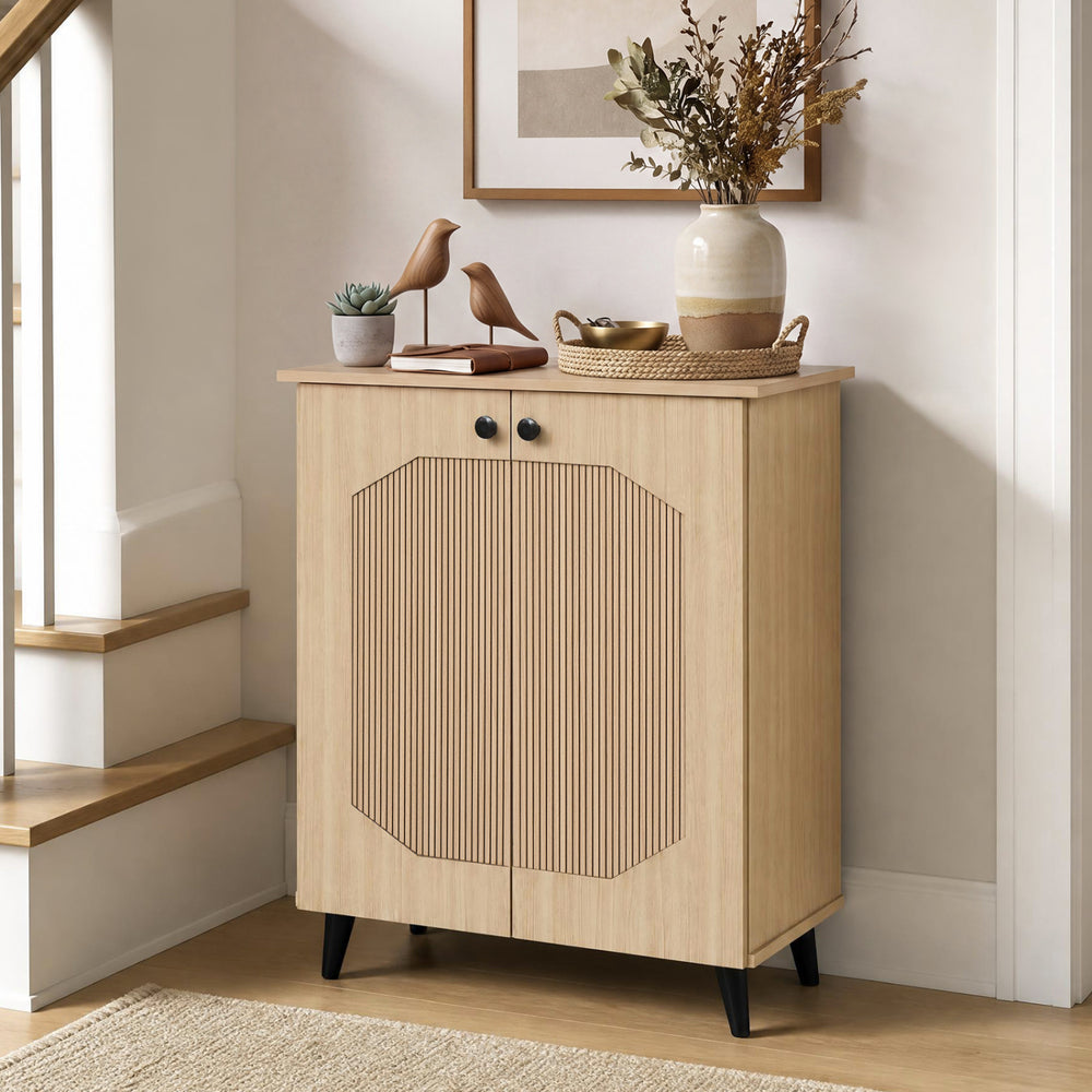 Natural geometric cabinet with carved panels, featuring two doors and ample storage for footwear in entryway or hallway.