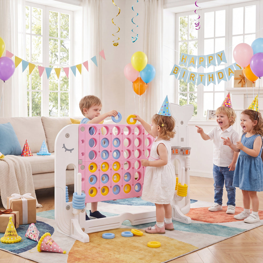 Children enjoy the Giant 4-to-Score Game Set with ring-toss, featuring a whale design and multiple game options.