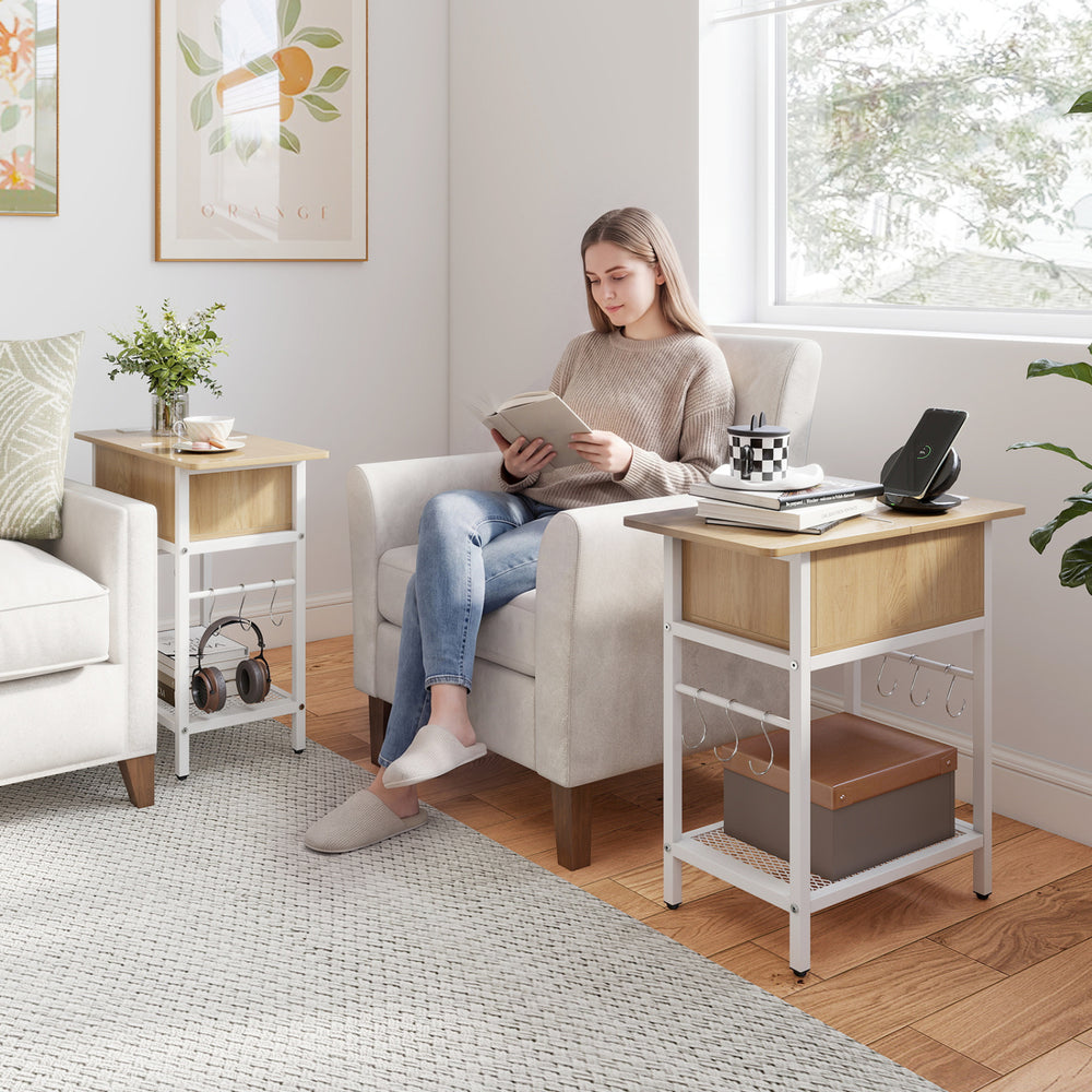 Natural wood end table with charging station, USB ports, and S hooks, perfect for living room or bedside use.
