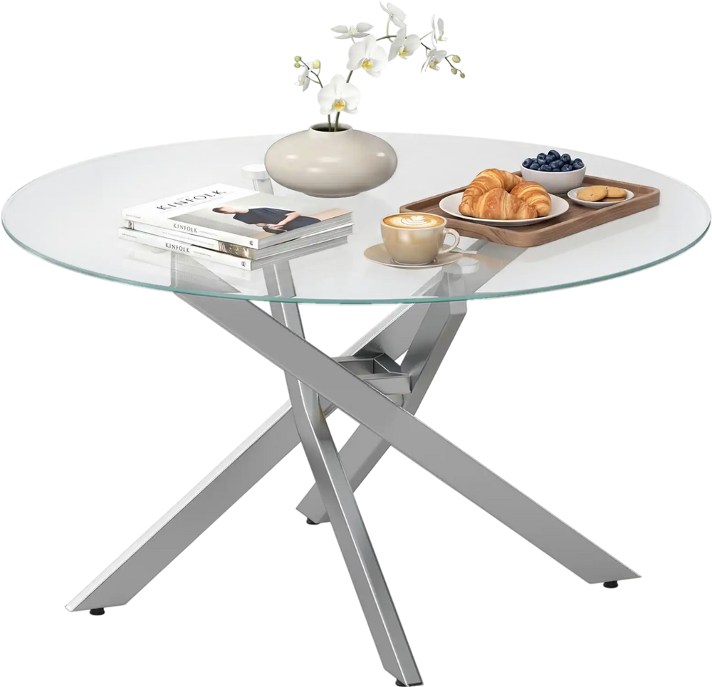 Round glass coffee table with a tempered glass top and silver geometric metal frame, perfect for modern living spaces.