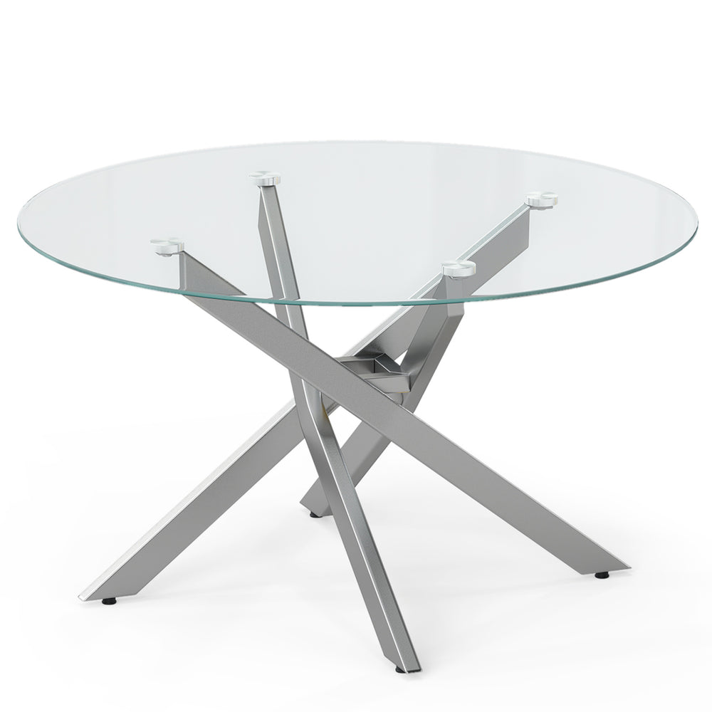 Round coffee table featuring a clear tempered glass top and a stylish silver geometric base, ideal for contemporary.