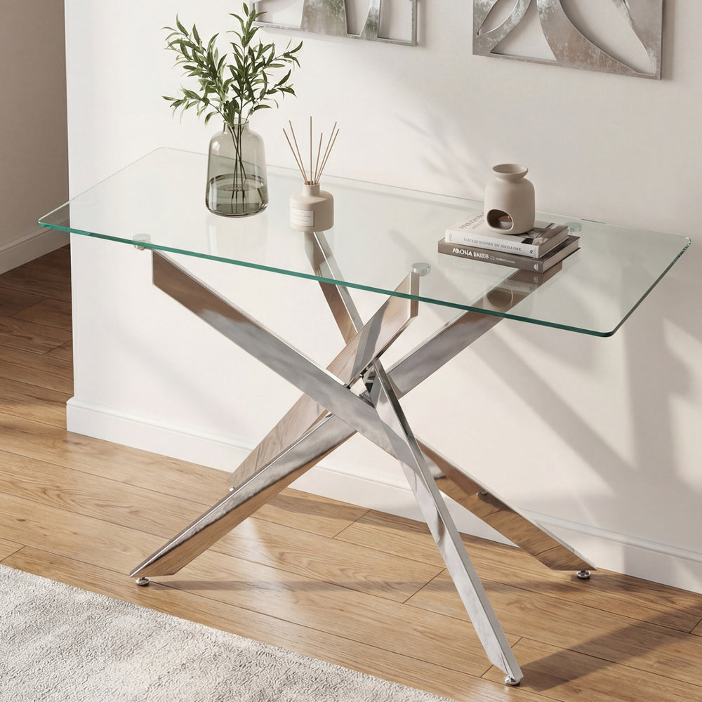 Modern glass console table with a clear tempered glass top and chromed metal legs, perfect for stylish entryway display.