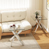 Square glass side table with a sleek tempered glass top and sturdy silver metal X base, ideal for modern living rooms.
