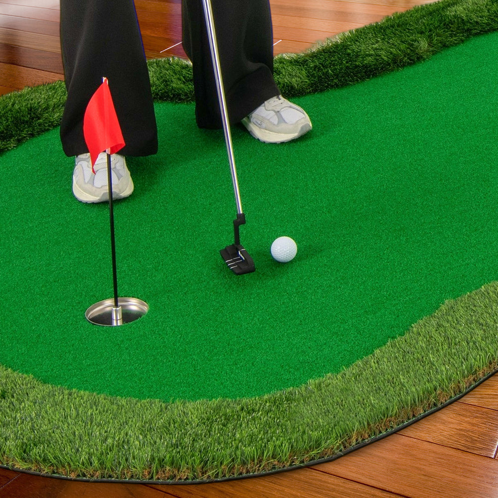Golf practice putting green mat with realistic turf, featuring three holes and a golf ball for indoor or outdoor use.