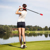 Golf Swing Trainer Click Stick in use, featuring a red foam headcover and fiberglass shaft for optimal flexibility and.