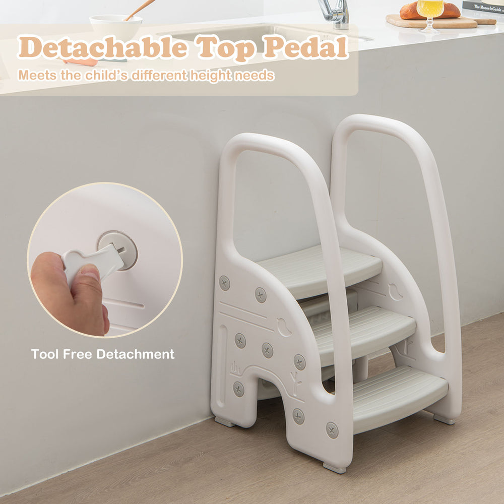 3-step stool in gray with safety handles and non-slip pedals, ideal for toddlers' height needs and potty training.