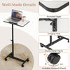 Gray overbed rolling table with adjustable height, 360° rotating tabletop, and sturdy metal frame for versatile use.