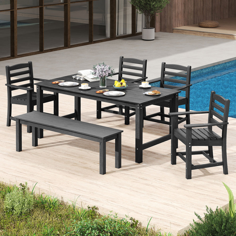 Black HDPE patio dining chairs set of 2 with wide armrests, perfect for outdoor relaxation by the poolside.