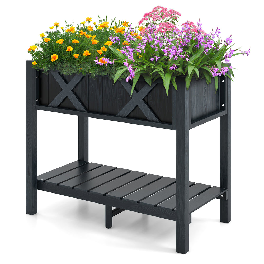 Elevated black HIPS raised garden bed with vibrant flowers, featuring a slatted shelf for gardening accessories.