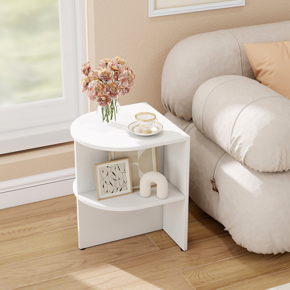 Half round white end table with open shelves, perfect for small spaces, enhancing elegance in living rooms or bedrooms.