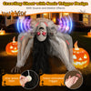 Lifelike crawling woman ghost decoration with LED eyes, sound effects, and voice activation for Halloween.