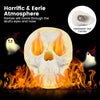 Realistic beige skull fire pit decoration with flames escaping from eyes and nose, perfect for Halloween ambiance.