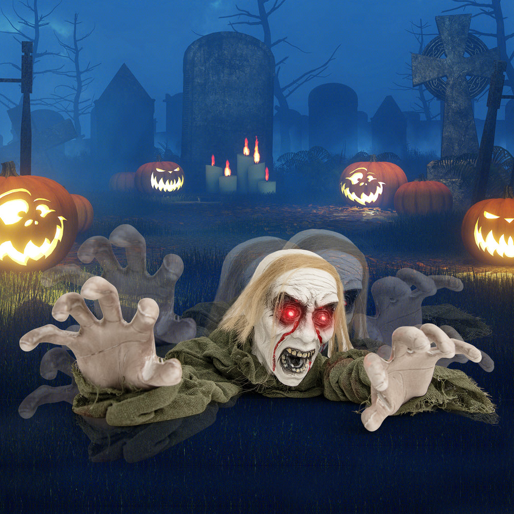 Halloween Groundbreaker Climbing Zombie with light-up eyes, emerging from the ground, ideal for spooky yard displays.