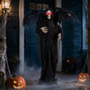 Life-size Halloween Standing Grim Reaper with red glowing eyes, tattered wings, and shaking head for spooky decorations.