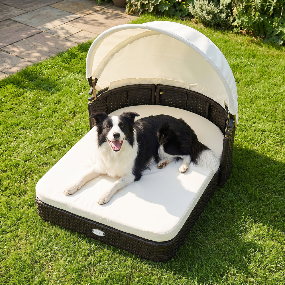 Handwoven rattan pet daybed featuring a cozy design with a plush cushion and adjustable canopy for small and medium dogs.