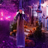 Life-size hanging animated witch decoration with glowing red eyes and posable arms, perfect for Halloween parties and.