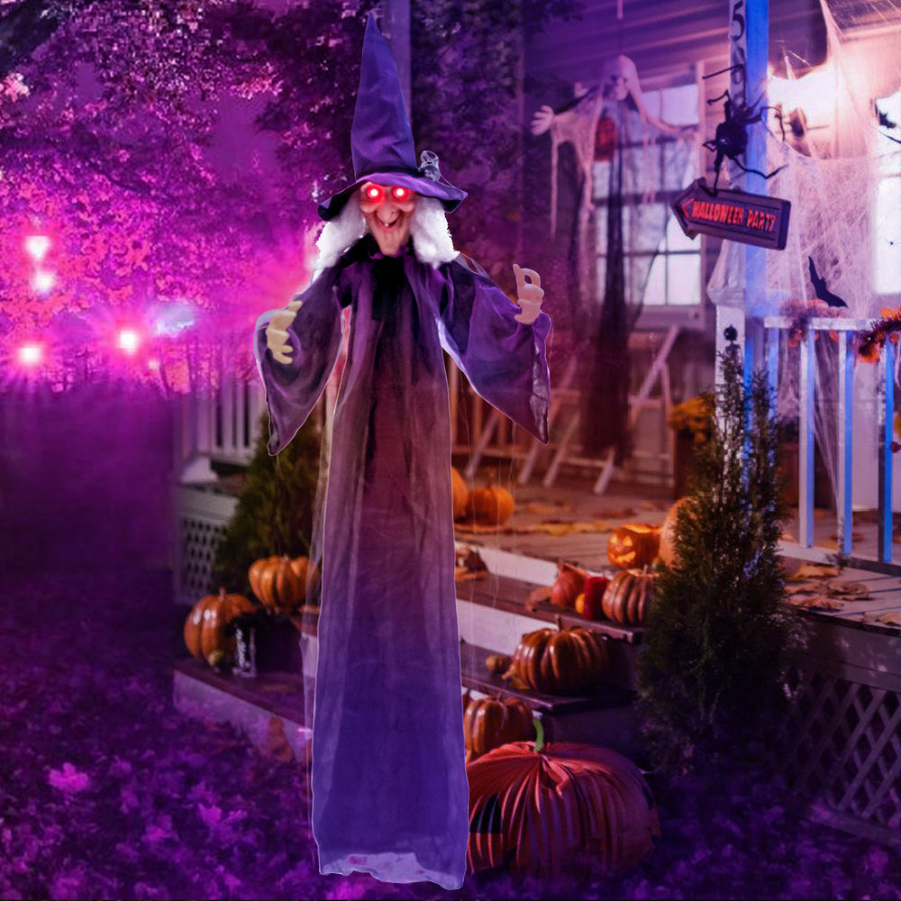 Life-size hanging animated witch decoration with glowing red eyes and posable arms, perfect for Halloween parties and.
