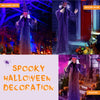 Life-size hanging animated witch decoration with glowing red eyes and posable arms for spooky Halloween parties.