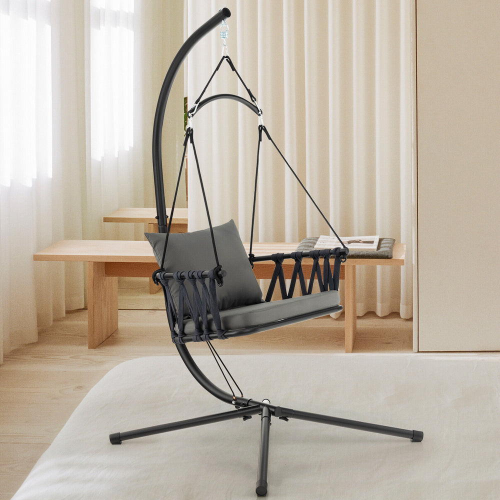 Gray hanging swing chair with stand, featuring soft cushions and a reinforced metal frame for indoor and outdoor use.