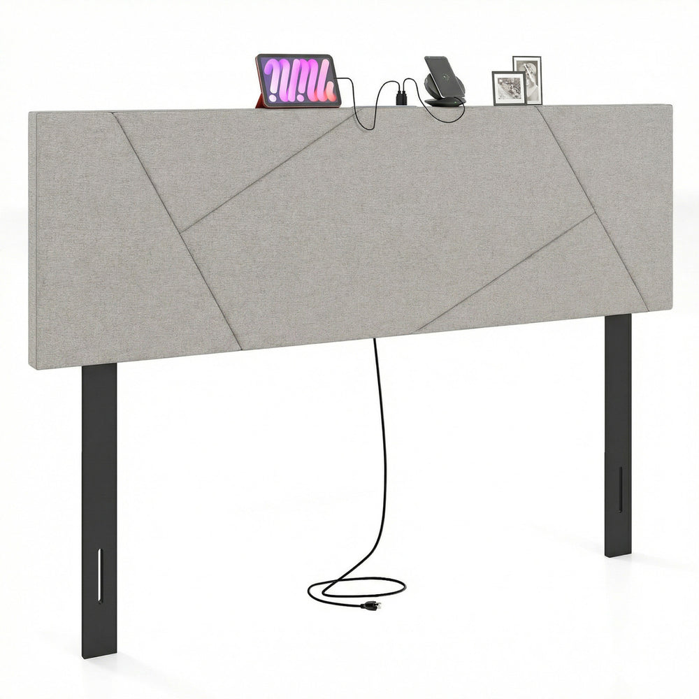 Geometric gray upholstered headboard for full and queen size beds with charging ports and rubber wood legs.