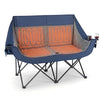 Heated double camping chair in navy with 4 heating zones, wine glass holders, and sturdy metal frame for outdoor comfort.