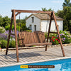Heavy-duty carbonized fir wood swing frame with reinforced bars and dual hanging rings for outdoor stability and durability.
