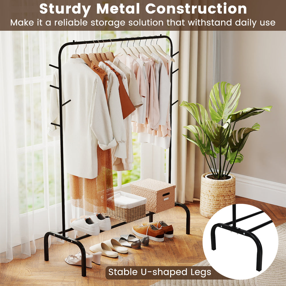 Heavy duty black metal garment rack with hanging rod, side hooks, and bottom shelf for versatile storage in any space.