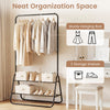 Heavy duty black clothes rack with hanging rod and two storage shelves, ideal for organizing dresses and shoes.