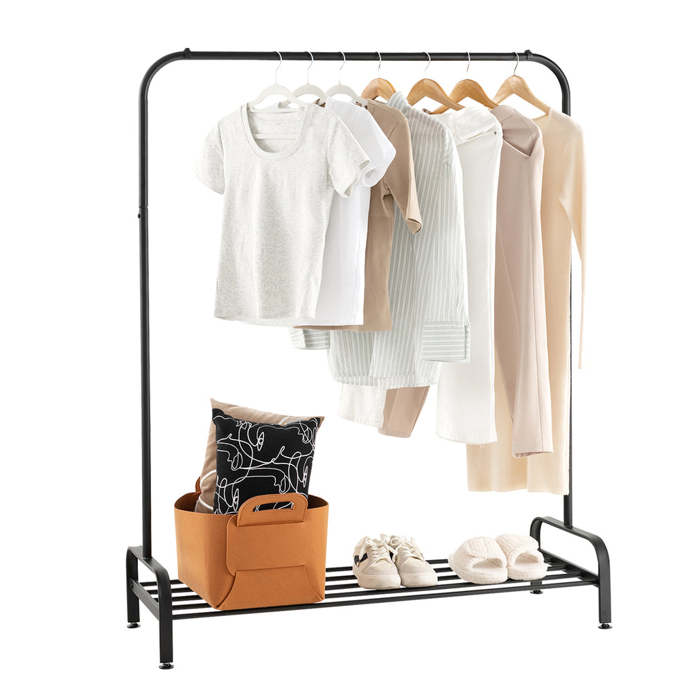 Heavy duty clothes stand rack with top rod and lower storage shelf, featuring a sturdy metal structure for organized.