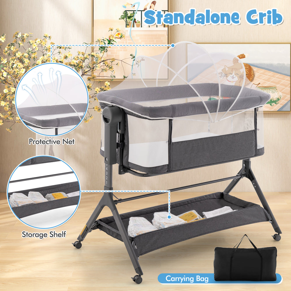 Height adjustable bedside sleeper in gray with storage shelf, protective net, and soft mattress for safe baby sleep.
