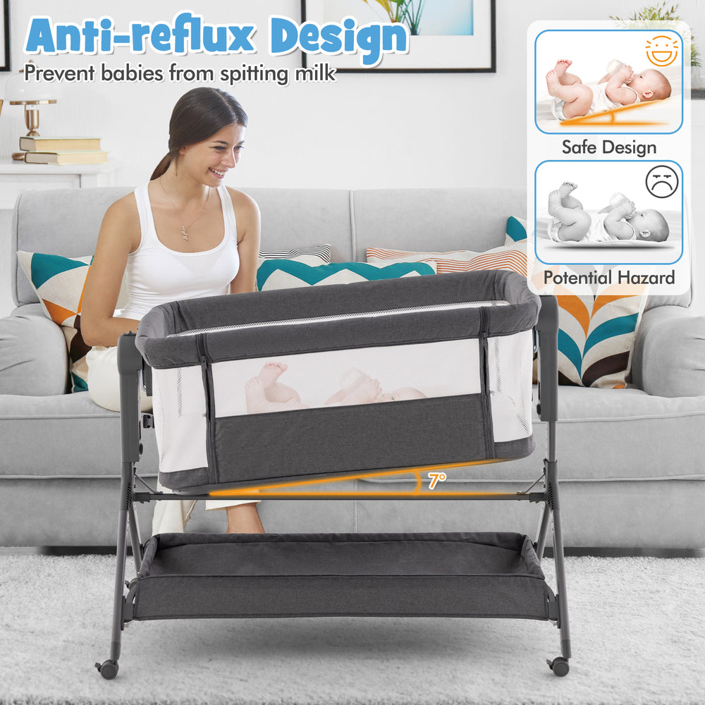 Height adjustable bedside sleeper in gray with soft mattress, 7° incline, and storage bag for baby essentials.