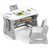 Height adjustable kids table and chair set in gray with tiltable whiteboard, ideal for studying and drawing.