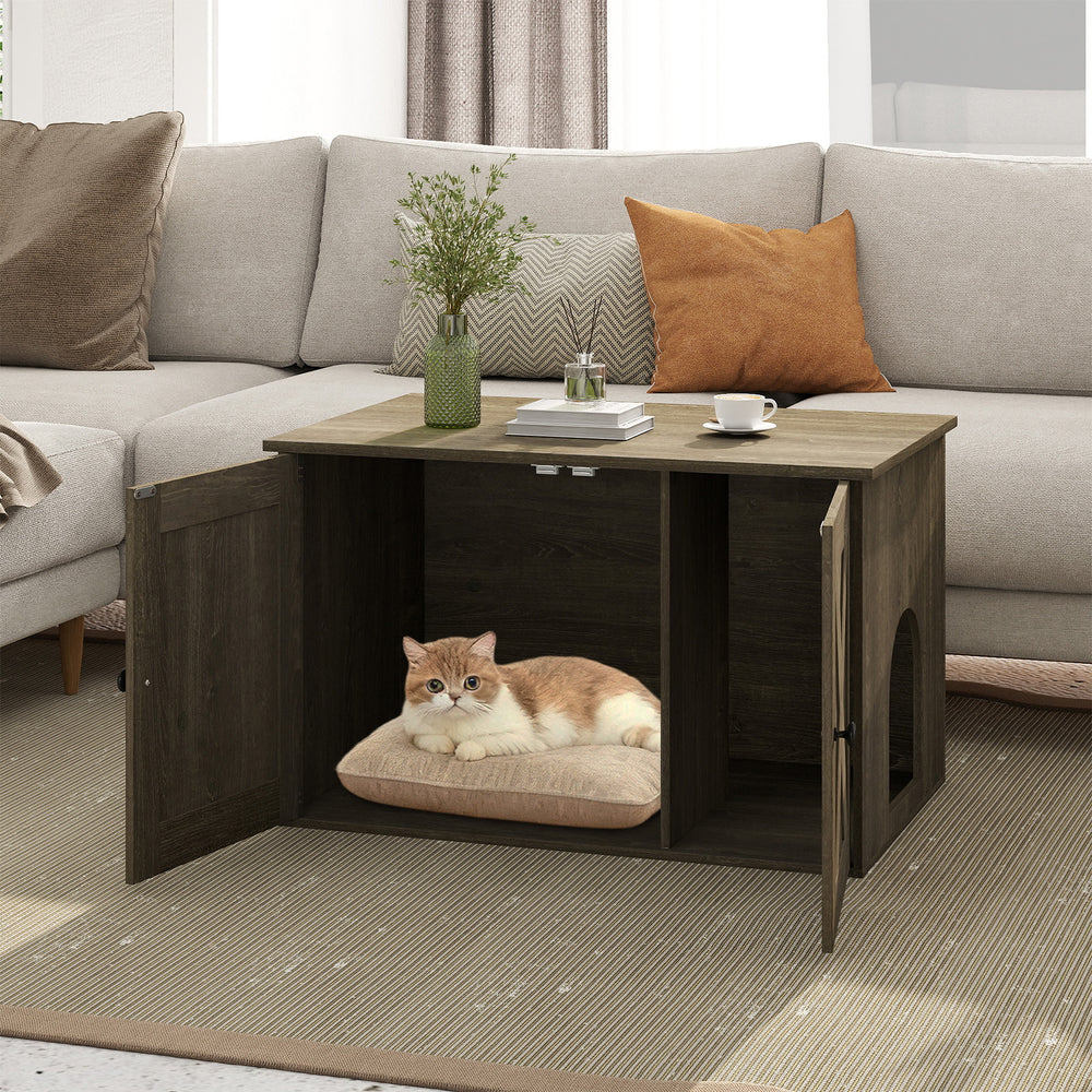 Hidden cat litter box enclosure in oak finish, serving as a stylish coffee table with dual doors for easy access.