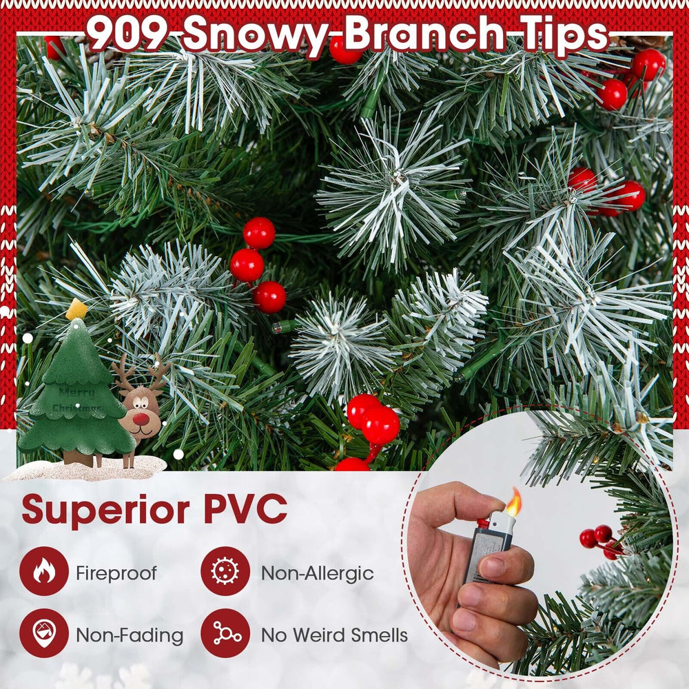 Close-up of snowy branch tips on a 6.5 ft hinged Christmas tree, featuring fireproof PVC and vivid red berries.