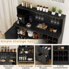 Home bar cabinet in black features wine rack, glass holders, adjustable shelf, and ample storage for versatile use.