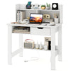 Home office computer desk in white with storage shelves, drawer, and built-in charging ports for organized workspace.