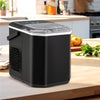 Countertop ice maker in black, producing 9 bullet-shaped ice cubes in 6-13 mins, ideal for home or office use.
