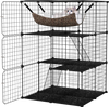 3-tier black metal cat cage with cozy hammock, climbing ladders, and lockable doors for secure pet play and rest.