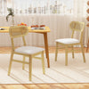 Set of 2 indoor mid-century wood dining chairs with rattan backrest and white PU leather seats for modern dining rooms.