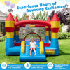 Colorful 3-in-1 kids bouncer with slide and basketball hoop for outdoor fun, made of durable waterproof fabric.