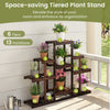 Multi-tiered brown wood plant stand with 6 tiers, designed for indoor and outdoor use, showcasing potted plants.