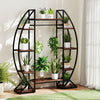 Curved 10-tier indoor plant stand in brown metal, ideal for displaying potted plants in living rooms or balconies.