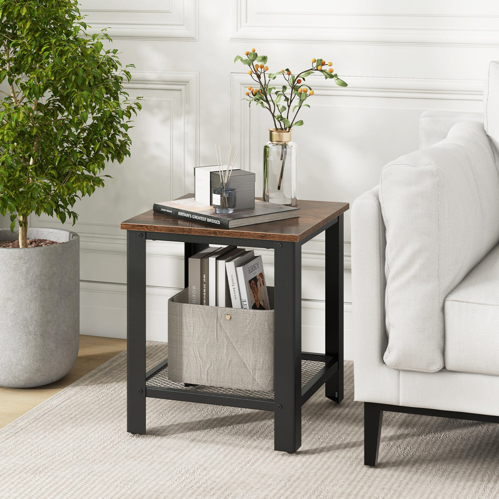 Industrial end table with a black frame and wood top, featuring a lower shelf for storage, ideal for living room use.