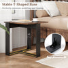 Detail of the industrial sofa end table's T-shaped base with metal connectors and screw hole covers for stability and.