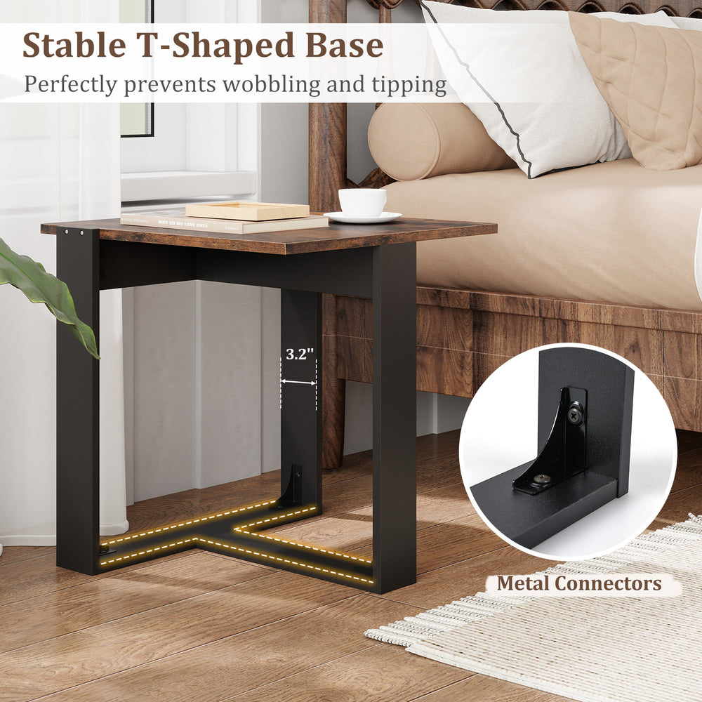 Detail of the industrial sofa end table's T-shaped base with metal connectors and screw hole covers for stability and.